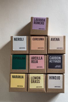 nine boxes of soaps are stacked on top of each other in different colors and sizes