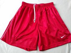 NIKE Boys Red On Red Striped Athletic Basketball Shorts Sz Large. The pics make these look a little pink...they are not however.  They are very red.  Although this item is preowned, it is in fabulous condition.  See pics for more details.  Thank you for visiting my store, Hamilton House Boutique.  Come visit again!! Casual Red Athletic Shorts For Sports Season, Nike Red Sporty Athletic Shorts, Nike Sporty Red Athletic Shorts, Red Athletic Shorts For Sportswear, Red Nike Athletic Shorts, Nike Red Sportswear Shorts, Nike Red Moisture-wicking Bottoms, Casual University Red Bottoms For Sports Events, Casual Red Athletic Shorts For Streetwear