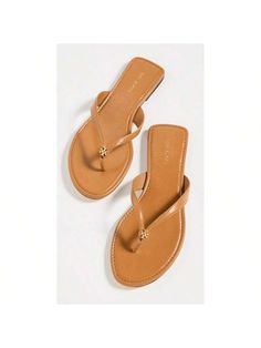 Leather: Calfskin 
Thong strap with gold-tone logo emblem 
Lightly cushioned footbed 
Rubber sole 
Imported, Vietnam 
This item cannot be gift-boxed 
Leather Flip Flops Caramel Corn Vacation        Women Shoes, size features are:Bust: ,Length: ,Sleeve Length: Trendy Gold Leather Sandals, Classic Gold Leather Sandals, Trendy Gold Synthetic Flip Flops, Gold Trendy Synthetic Flip Flops, Classic Gold Sandals With Leather Footbed, Gold Leather Flat Flip Flops, Classic Gold Sandals With Cushioned Footbed, Classic Brown Flip Flops With Leather Footbed, Classic Brown Flip Flops With Cushioned Footbed