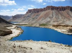 a large body of water surrounded by mountains