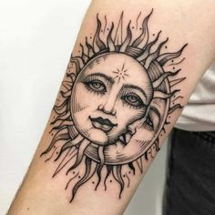 a sun and moon tattoo on the arm