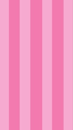 a pink striped wallpaper with vertical stripes