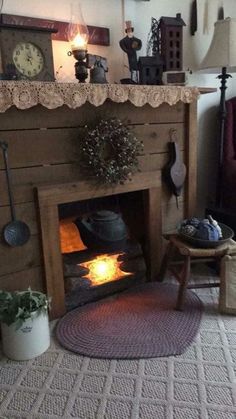 a living room filled with furniture and a fire place next to a wall mounted clock