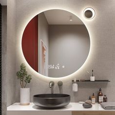 a bathroom with a round mirror above the sink