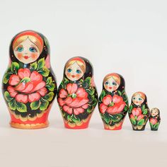 a group of russian nesting dolls sitting next to each other