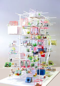 a model of a house made out of shelves