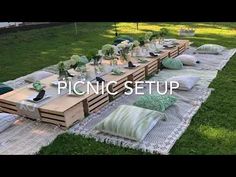 picnic set up with pillows and table cloths