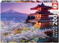 a puzzle box with an image of a pagoda and cherry blossoms in the foreground