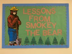 there is a sign on the wall that says lessons from smokey the bear,