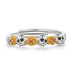 Inspired by a music-loving boy's magical journey, this amazing detailed stacking ring boasts musical note, a little boy strumming a guitar, a dog, skulls, and flowers. The intricate flawless enamel work coupled with sparking stones, make this an eye-catching piece. Join the music-loving boy on his marvelous adventure, and let this stacking ring be a testament to the power of passion, creativity, and the magic of music.Plating Color: Silver Adjustable Yellow Open Ring, Yellow Adjustable Open Ring, Adjustable Stackable Band Rings For Gift, Sterling Silver Skull Rings, Dreamy Garden, Silver Skull Ring, Sterling Silver Stacking Rings, Yellow Rings, Silver Stacking Rings