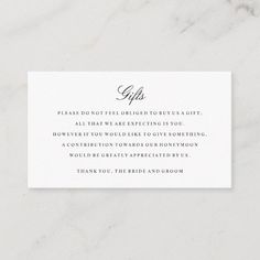 a white card with the words gifts on it