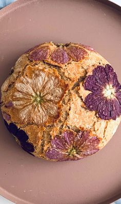 an orange and grape fruitcake on a plate