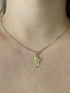 14k solid yellow gold Angel praying pendant.Material: Real 14k solid gold.Length: Approximately 3/4 of an inch long.Width: Approximately 1/2 an inch wide.Weight: Approximately 1.5 grams of gold.Comes in a nice box.*Chain Sold Separately at check out.  Chain typically comes in 1-2 grams. Spiritual 14k Gold Jewelry Stamped 14k, 14k Gold Tarnish Resistant Pendant Charm Necklaces, Tarnish Resistant 14k Gold Pendant Charm Necklaces, 14k Gold Tarnish Resistant Pendant Charm Necklace, Gold-plated 14k Stamped Pendant Charm Necklace, Gold-plated Charm Necklace Stamped 14k, Fine Jewelry 14k Stamped Pendant Charm Necklace, 14k Gold Pendant Necklace Stamped 14k, Fine Jewelry 14k Gold Stamped Charm Necklaces