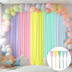 a baby's room decorated in pastel colors with balloons, crib and toys