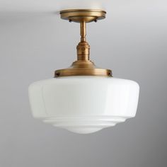 a light fixture hanging from the ceiling in a room