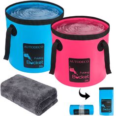 two buckets with towels and towel next to each other, one blue and the other pink