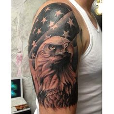 an eagle with the american flag on it's head is shown in this tattoo