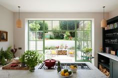 the kitchen is clean and ready to be used as a dining room or living area