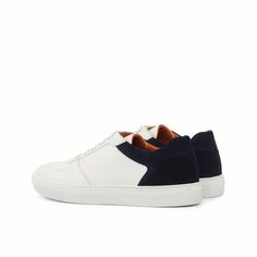 Classic Navy Sneakers With Contrast Sole, Navy Leather Sneakers With Gum Sole, Classic Navy Sneakers With Textured Sole, Modern Skate Shoes With Textured Sole, White Leather Skate Shoes For Everyday, Modern Everyday Low-top Custom Sneakers, Modern Low-top Custom Sneakers For Everyday, Classic High-top Sneakers With Contrasting Heel Counter, Modern Custom Sneakers With Contrasting Heel Counter