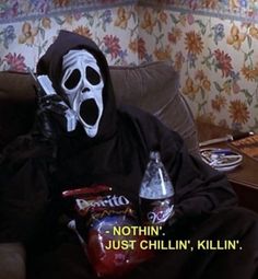 a person wearing a mask and holding a bottle in front of their face with the caption, nothing just chillin'kill