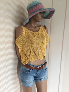 If you need something to just cover your shoulders, armpits and chest this  yellow fishnet crop sweater will be there. Also can be used to cover a bikini top on the beach. I made it using quality cotton yarn. It's loosely knitted, and secured under the armpits so it's steady and doesn't rise or swing around. Measurements: width: 25' = 64cm lenght: 11' = 28cm The length can be longer or shorter as you wish it to be. Just convo me the length you require . This item is ready to ship and will be shipped out with in 4-5 days of receipt of payment. Friday night orders are sent monday morning.   Your purchased item will be delivered in 5-7 days everwhere of the world. For other stunning styles of mrlworks please try below link  https://www.etsy.com/shop/Mrlworks?ref=seller-platform-mcnav Thank yo Open Knit Tops For Summer Beach Cover-up, Stretch Crop Top For Summer Beach, Stretch Crop Top For Beach In Summer, Summer Knit Crochet Top, Crochet Top For Warm Weather And Summer, Crocheted Top For Warm Weather And Summer, Cotton Crochet Top For Beach Season, Stretch Crochet Top For Summer, Stretch Crochet Top For Summer Beachwear