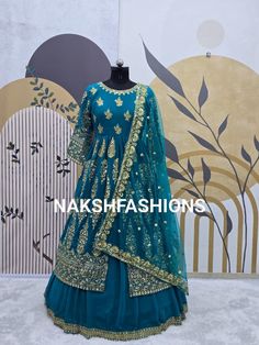 Fabric Detail🧵* *Top Fabric * :Faux Georgette With *Heavy Embroidery 5 mm Sequence Work* With Embroidery Sleeve  *Top Flair*         :2.5 Meter  *Top Inner *      : Micro Cotton  *Top Length *       :52-53 Inches *Top  Size*.            : *42 xl free size Xxl Margin*  *(fullstitched )* *Lehenga fabric* :Faux Georgette With * 5 mm Embroidery Sequence Lace Border  *(semistitched)* *Lehenga Inner*    : Micro Cotton *Lehenga Flair*     :3 Meter *Dupatta Fabric * : Soft Butterfly Net With Embroidery Fitted Lehenga With Dabka Work For Ceremony, Blue Anarkali Dress For Ceremony, Fitted Embroidered Anarkali Set For Ceremony, Green Dresses With Zari Work For Ceremonies, Ceremonial Green Dress With Dupatta, Green Ceremony Dress With Dupatta, Fitted Blue Choli With Dabka Work, Blue Embroidered Sets For Ceremony, Green Resham Embroidery Ceremony Set