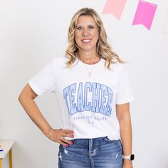 Elevate your classroom style with our "Teacher Bow Grade Level" Bella Graphic Tee! This adorable tee celebrates every grade level from Kindergarten through 5th grade, making it a perfect choice for passionate educators. Crafted from ultra-soft Bella Canvas fabric, this tee ensures all-day comfort, whether you're teaching lessons, grading papers, or inspiring young minds. The delightful bow design adds a touch of charm, while the grade level customization lets you proudly represent your classroom Graphic Tee With Text Print For Teaching, Back To School T-shirt With Text Print For Teaching, School Spirit Letter Print Top, School Spirit T-shirt With Text Print For Teacher Appreciation, Teacher Appreciation Crew Neck T-shirt For Back To School, Back To School Text Print T-shirt For Teaching, White Tops For Teacher Appreciation Back To School, Text Print T-shirt For Teacher Appreciation, Back To School Graphic Tee For Teaching