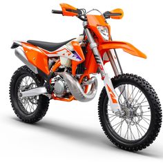 an orange dirt bike is shown on a white background