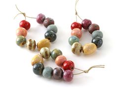 Beads are our heritage. For the first 3 years of our existence, Lima Beads only sold beads. We built our business and started to grow because we focused on having the best selection of gemstone beads anywhere. We still have a great selection of gemstones, but we've also expanded this focus to other areas that you'll see below. One thing is true about all of these beads – we care deeply about their quality and consistency. Handmade Artisan Rondelle Beads, Handmade Rondelle Artisan Beads, Earthy Spacer Beads For Jewelry Making, Artisan Gemstone Beads For Jewelry Making, Artisan Colorful Beads For Jewelry Making, Colorful Oval Beads For Crafting Jewelry, Artisan Beaded Necklace With Oval Spacer Beads, Unique Round Gemstone Beads, Earthy Large Beads For Jewelry Making