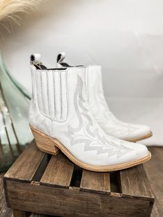 These beautiful boots are handmade in Mexico and are of the highest quality. They are a white color with beautiful stitching detail. Snip toe. They do run true to size. Don’t miss out on these beauties. Some photos appear somewhat silver, these are not silver. Shaft height: 6 inch Heel height: 2 inch More photos to come* Short Cowboy Boots, 6 Inch Heels, Embroidered Leather, Thick Heel, Beautiful Boots, Leather High Heels, Thick Heels, Leather Booties, Rock Music