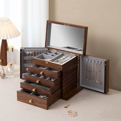 A large high-quality walnut  jewelry box that meets every woman's imagination of jewelry boxes. The High-capacity 5 layer solid wood  jewelry storage Box  with 2-Door,give you a space for orderly placement, it is absolutely right to choose this jewelry  Storage box! The Solid wooden Jewelry box r.Multi-Functional Storage Case,Cleverly divided design expands space capacity and holds more precious jewelry for you. **2 door design,large capacity, can hold your precious jewelry, and allow you to hav Brown Rectangular Jewelry Storage As Gift, Tabletop Wood Jewelry Box, Elegant Rectangular Jewelry Storage Gift Box, Jewelry Box Plans Rockler Woodworking & Hardware, 5th Wedding Anniversary Gift, Ring Storage, Luxury Jewelry Storage Box, Rectangular, Jewelry Safe, Anniversary Gifts For Wife