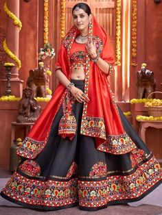 Bring to life the classic cool spirit of traditional style and culture by accessorizing yourself with this attractive black color silk material chaniya embellished with pretty gamthi work and real mirror work.This black color rajwadi Ghaghra is semi-stitched up to 42 inches bust & waist and comes with fully unstitched 1-meter choli material. Price:₹3,799.00 Gamthi Chaniya Choli, Gamthi Work, Garba Dress, Ghaghra Choli, Lehenga Red, Sabyasachi Lehenga, Black Lehenga, Navratri Chaniya Choli, Lehenga Choli Online