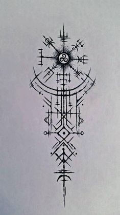 a black and white drawing of a compass