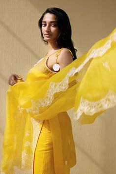 Yellow noodle strap tie-up sleeves kurta crafted in organza with wildbloom contrasting white thread embroidery. Paired with a cotton satin pant and cutwork border floral embroidered dupatta. - Aza Fashions White Thread Embroidery, Yellow Noodles, Noodle Strap, Satin Pant, Organza Embroidery, Kurta Pant Set, Embroidered Dupatta, Satin Pants, Kurta With Pants