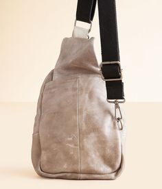 Bed Stu Beau Leather Sling Backpack - Grey , Women's Iciclerusticnectar Distressed leather fabric lined backpack Zipper and hook closures Interior zipper and pouch pockets Adjustable shoulder strap Dimensions: 8(L) x 2 1/2(W) x 13(H). Due to the nature of leather/suede, small variances of color in the skin may occur, this is in no way considered a defect. These are inherent characteristics of leather/suede and will enhance the individual look of your garment.. Genuine leather. Apparel & Accessor Leather Chest Bag With Detachable Strap For Daily Use, Leather Shoulder Chest Bag With Adjustable Strap, Leather Chest Bag With Adjustable Strap, Leather Chest Bag With Detachable Strap, Everyday Carry Shoulder Bag With Adjustable Strap, Functional Leather Crossbody Backpack, Leather-backed Crossbody Chest Bag For Daily Use, Leather Backed Crossbody Chest Bag For Daily Use, Leather Sling Shoulder Bag For Everyday