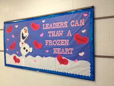 a bulletin board that says leaders can have a frozen heart on the wall in front of them