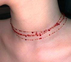 This is a dainty and elegant Halloween-themed necklace featuring layers of transparent cords adorned with realistic red "blood drop" embellishments. The adjustable design allows it to fit comfortably on various neck sizes, creating a striking and spooky illusion of dripping blood. Perfect for completing Halloween costumes or adding a unique twist to any edgy outfit. Blood Necklace, Vampire Necklace, Vampire Jewelry, Blood Drop, Zombie Costume, Fantasias Halloween, Fancy Jewelry, Halloween Jewelry, Party Looks