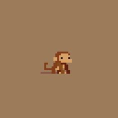 a pixellated monkey sitting on top of a brown floor