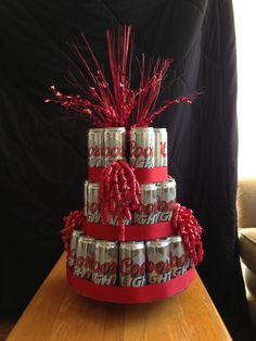 a cake made out of cans on top of a table