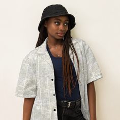 Discover the Ultimate Summer Wardrobe Essential: The All-Over Print Collared Unisex Button-Down Shirt! 🌟 👕 **Ultra-Comfortable & Stylish Dive into summer with flair in our All-Over Print Collared Unisex Button-Down Shirt. Designed to impress and built for comfort, this shirt is your perfect companion for every summer adventure. With a blend of 65% recycled polyester and 35% polyester, it offers a sustainable choice without compromising on style. 🌞 **Beat the Heat Say goodbye to discomfort on Cotton Camp Collar Top For Day Out, Retro Collared Shirt For Day Out, Retro Button-up Shirt For Day Out, Trendy Cotton Short Sleeve Shirt With Camp Collar, Graphic Print Button-up Shirt For Day Out, Retro Cotton Shirt For Day Out, Trendy Cotton Short Sleeve Shirt With Button Closure, Trendy Cotton Top With Camp Collar, Casual Button-up Blouse With Graphic Print