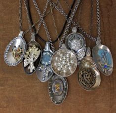 a bunch of necklaces that are hanging on a wall with the caption'yes i think i found a way to use all those one - off earrings that no longer are in my jewelry box