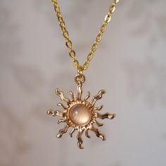 Make a statement with this pretty pink sun necklace for women. This cool quirky gold plated and acrylic pink sun necklace is a great way to add a nice touch to your outfit. The charm on this ladies sun necklace measures at 3cm x 2.7cm and is attached to a gold plated chain with lobster clasp. Various lengths of necklace chain are available, please select a length from the drop down menu. Please feel free to get in touch with us at Funky Earrings UK if you have any questions. We also have a wide range of other cute and unusual earrings and necklaces for her in our shop. Sun Fashion, Sun Jewelry, Acrylic Pink, Oc Stuff, Sun Necklace, Wardrobe Wishlist, Necklace Cute, Funky Earrings, Unusual Earrings