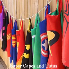 colorful superhero capes hanging on a clothes line with the caption super capes and tutus