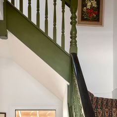 the stairs in this house are painted green