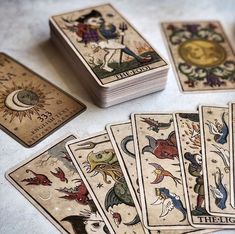 several playing cards with different designs on them