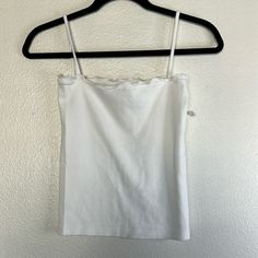 Nwot Brandy Melville White Camisole Os , No Flaws Noted Stretchy Approx. Measurements Length 19.5in P2p 13in Fitted Tank Strap Tops For Daywear, Fitted Tops With Tank Straps For Daywear, Fitted Casual Camisole For Daywear, Fitted Cotton Camisole For Daywear, Fitted Tank Top For Daywear, Fitted Top With Adjustable Straps For Daywear, Fitted Cotton Cami Tank Top, Fitted Tank Tops For Day, Fitted Camisole For Daywear