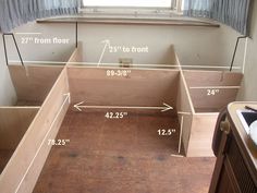 an empty kitchen is shown with measurements