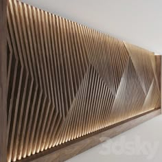 a wood paneled wall mounted on the side of a white wall with wooden slats