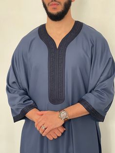 Limited edition colour and material! Mens Moroccan Thobe NEWEST COLLECTION! BEST PREMIUM QUALITY- Midnight Blue djellaba, Jubbah, Beautiful quality with a lovely soft feel and texture. Brand new, with original personal wrapping. We are known to many for our extensive Moroccan clothing collection. This is our newest collection yet, style and material carefully picked. BEST QUALITY! Extremely beautiful quality brand new Colour: Midnight Blue material: Extra premium cotton blend Size : please refer to size guide PLEASE NOTE: All our moroccan thobes have one pocket on *one side only*, and a slit on the other side to get to your trouser pocket Mens Moroccan Thobe - Midnight Blue|djellaba, Jubbah, is your best bet for a relaxed but stylish QUALITY look! Quality material that will last you a life Traditional Asian Dress, Stylish Men Wear