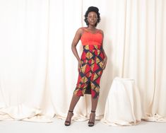 The Kuron African Print Midi Pencil Skirt combines traditional African patterns with a modern silhouette. This high-waisted skirt features a striking red and blue Ankara print, making it a perfect statement piece for any occasion. Pair it with the matching Kuron Blazer for a powerful and stylish look. Features: High-waisted pencil skirt for a sleek fit Striking red and blue Ankara print Midi length, perfect for both work and play Comfortable and breathable fabric Pairs perfectly with the matchin Ankara Midi Skirt, African Print Pencil Skirt, Blue Ankara, Ankara Print, High Waisted Pencil Skirt, African Pattern, Printed Pencil Skirt, Midi Skirt Pencil, African Culture